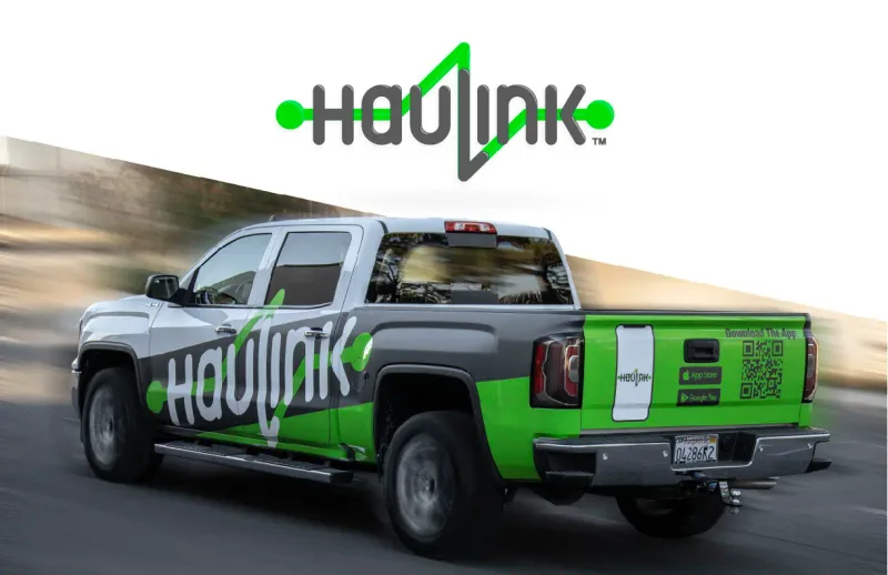 HauLink website shown on a laptop mockup